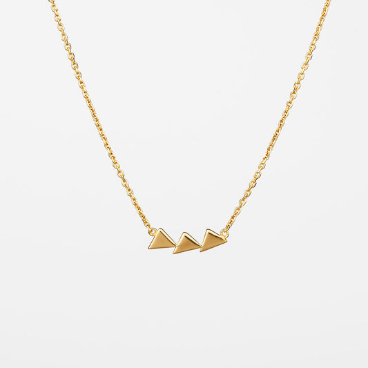 A gold-colored necklace featuring three geometric triangle pendants.