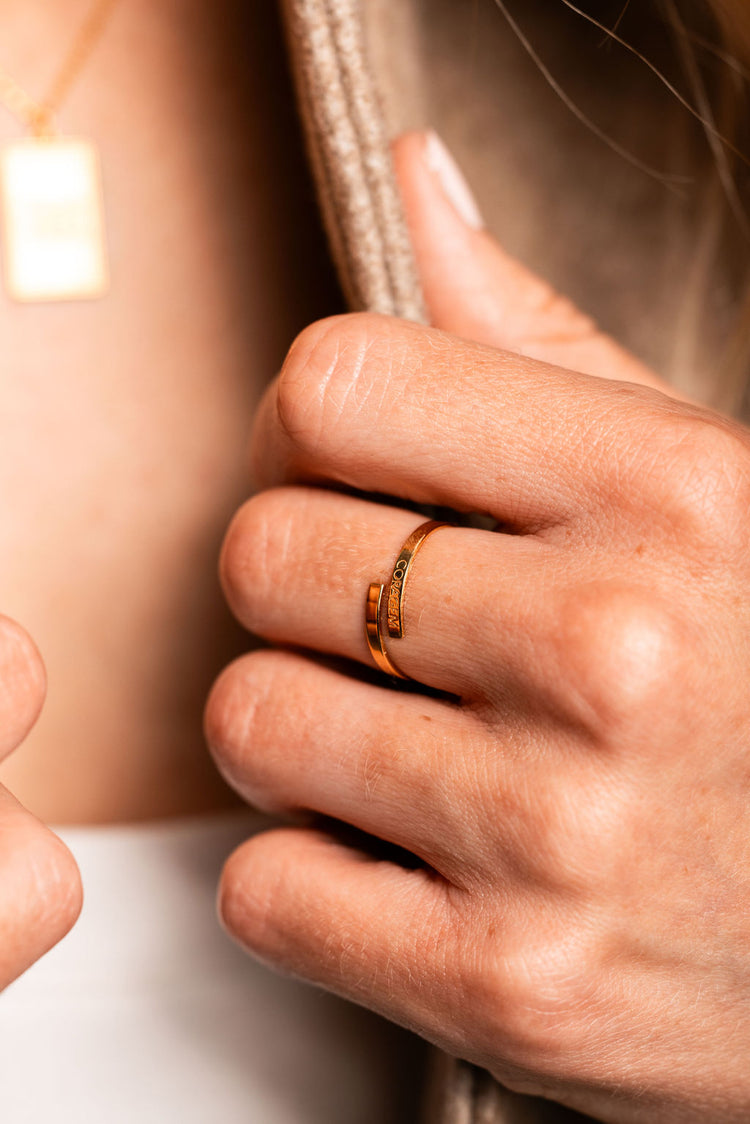 Adjustable gold vermeil ring with the word coragem, which is portuguese for courage
