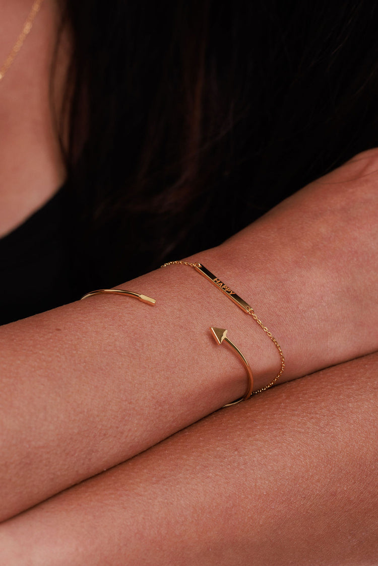 Happy gold bracelet and triangle cuff bracelet