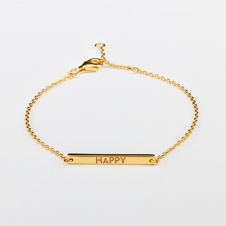 Happy bracelet on gold chain
