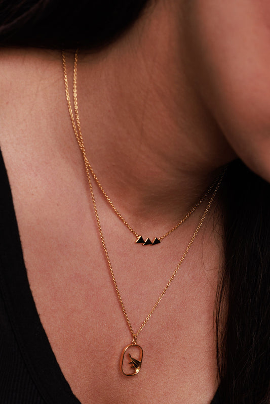 Triangle trio necklace and airplane necklaces in gold vermeil
