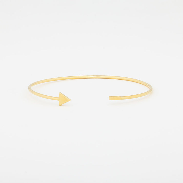 A gold vermeil triangle cuff bracelet on a white background