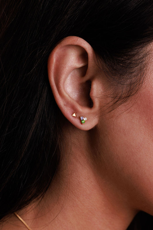 Triangle stud earrings with a gemstone trillion stud earring