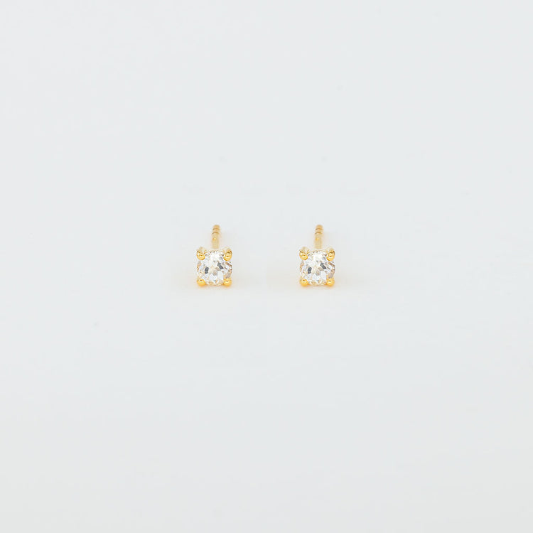 white topaz and gold stud earrings