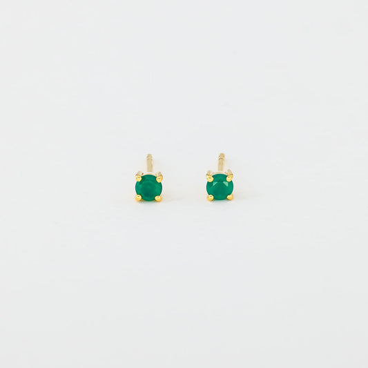 A pair of round green onyx stud earrings set in gold vermeil mounting.