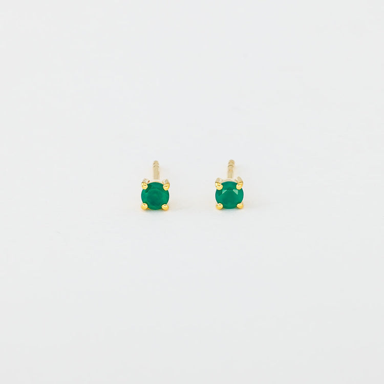 A pair of round green onyx stud earrings set in gold vermeil mounting.